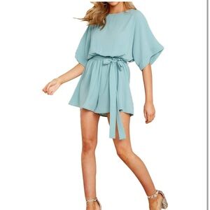 NWT. Sz MED. Pale Blue Foteisy short romper. rounded neck, batwing short sleeves
